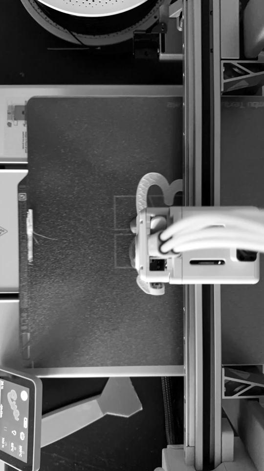 A name being 3D printed, layer by layer